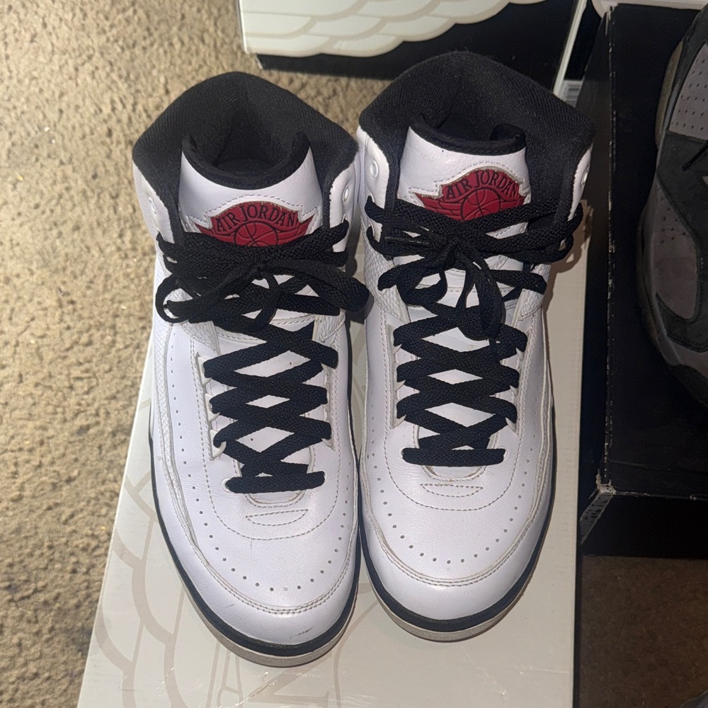 Jordan White and Black High-Top Sneakers
